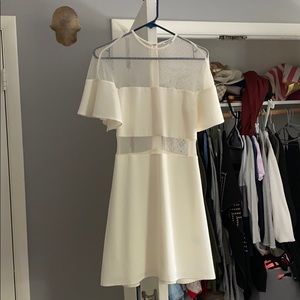 Beautiful white dress with mesh exposure